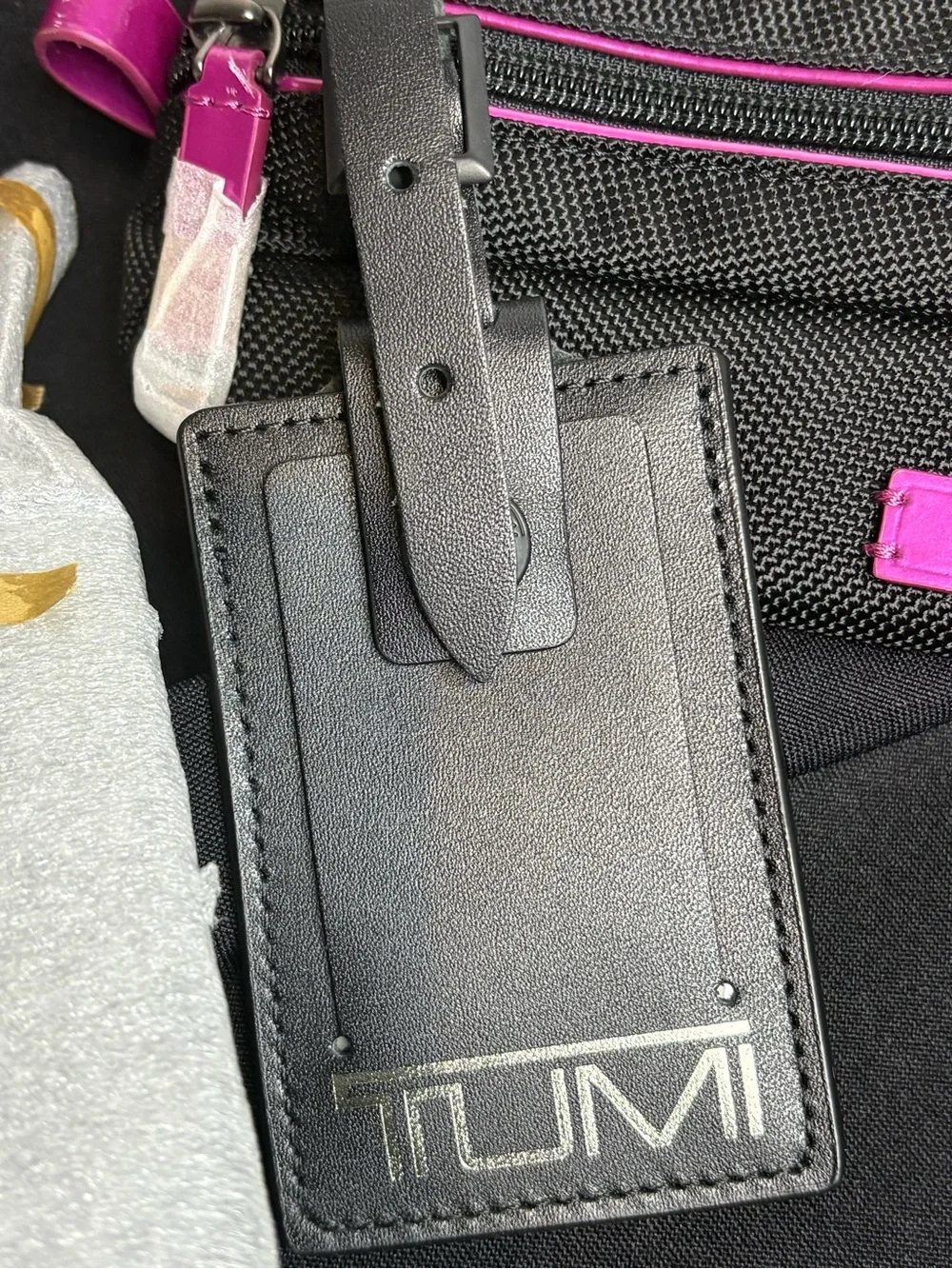 Tumi Black Travel Pouch with Pink Accents